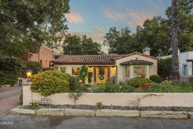 308 Topa Topa Dr, Ojai, CA 93023 - mediterranean / spanish-style home featuring a tile roof, a chimney, and stucco siding