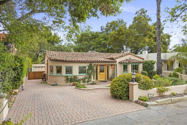 308 Topa Topa Dr, Ojai, CA 93023 - mediterranean / spanish home with a tiled roof and stucco siding