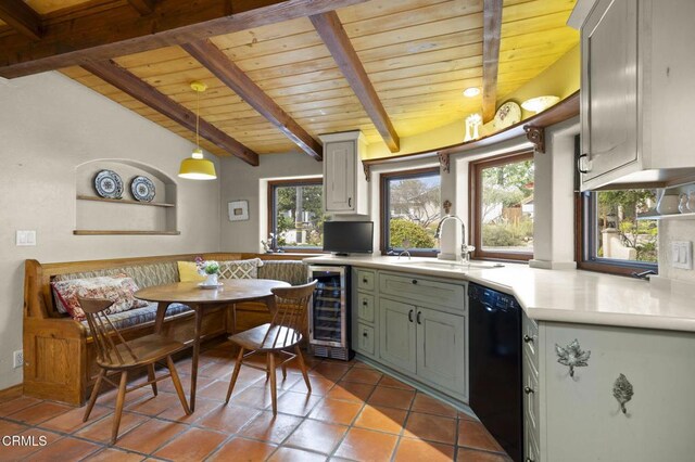 308 Topa Topa Dr, Ojai, CA 93023 - kitchen with black dishwasher, a wooden ceiling with exposed beams, wine cooler, breakfast area, and healthy amount of natural light