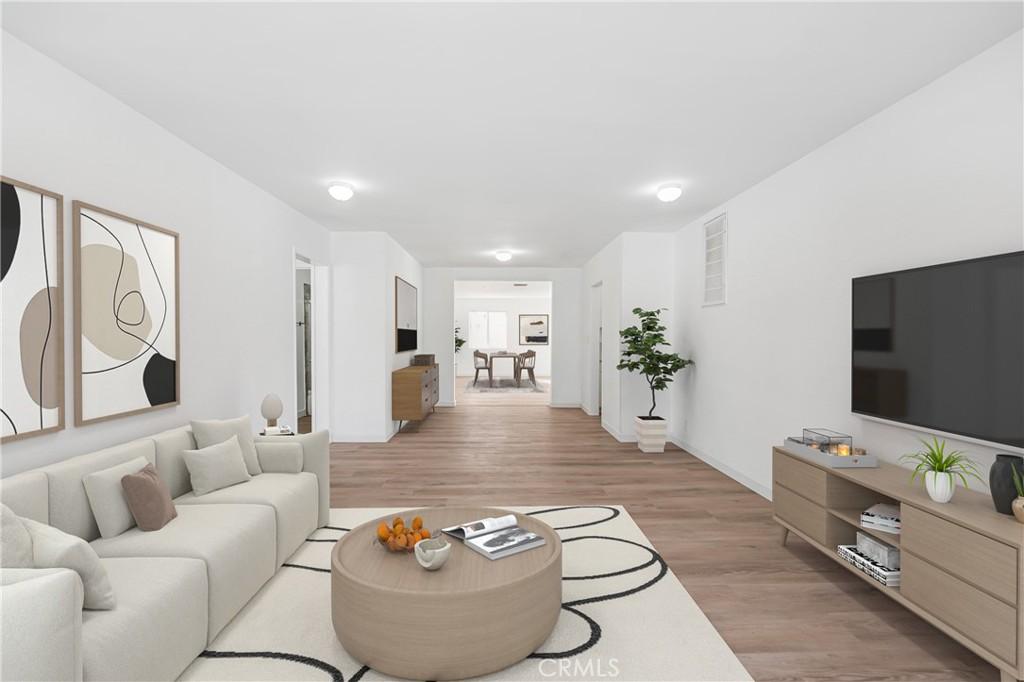 1841 N Garfield Ave, Pasadena, CA 91104 - living room featuring visible vents and light wood-style flooring