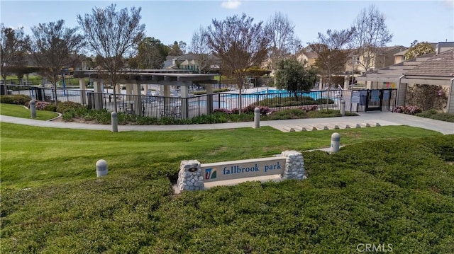 43 Ashbrook, Irvine, CA 92604 - view of property's community with a swimming pool, a yard, and fence
