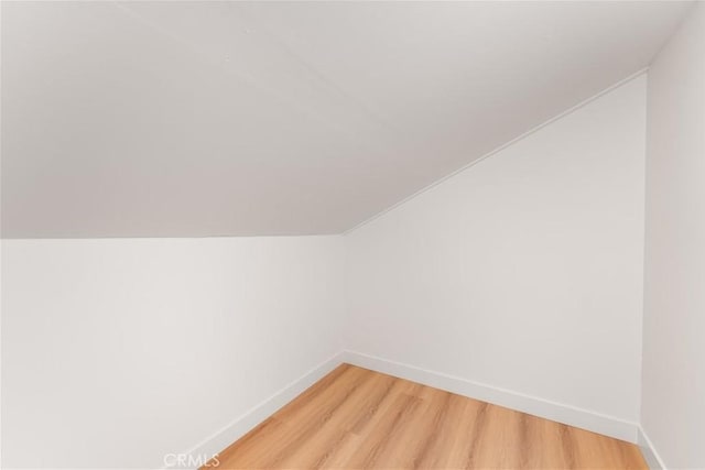 43 Ashbrook, Irvine, CA 92604 - bonus room featuring light wood-style flooring, baseboards, and lofted ceiling