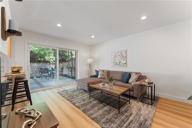 43 Ashbrook, Irvine, CA 92604 - living room featuring baseboards, recessed lighting, and light wood-style floors