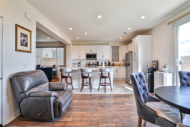 interior space featuring recessed lighting and light wood-style floors