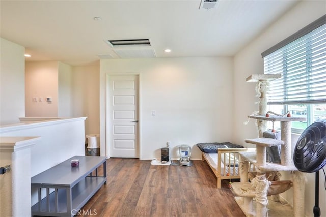 sitting room featuring visible vents, recessed lighting, wood finished floors, an upstairs landing, and baseboards