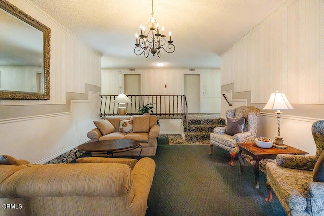 living area featuring stairway, an inviting chandelier, ornamental molding, and carpet floors
