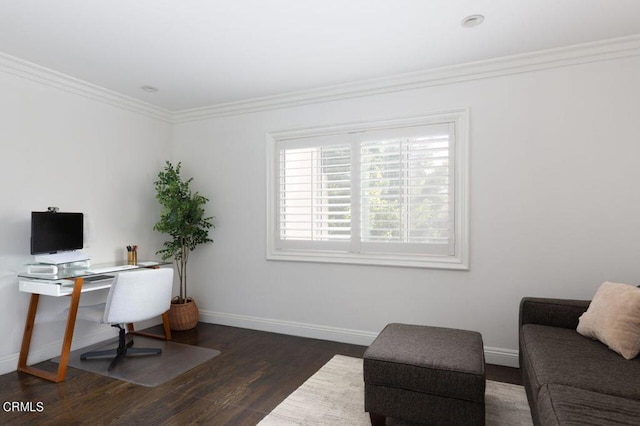 office space with crown molding, baseboards, and wood finished floors