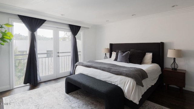 bedroom featuring baseboards, ornamental molding, french doors, access to exterior, and wood finished floors