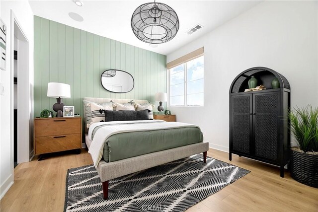 136 Hazel Dr, Rancho Mission Viejo, CA 92694 - bedroom with visible vents, baseboards, and light wood-type flooring