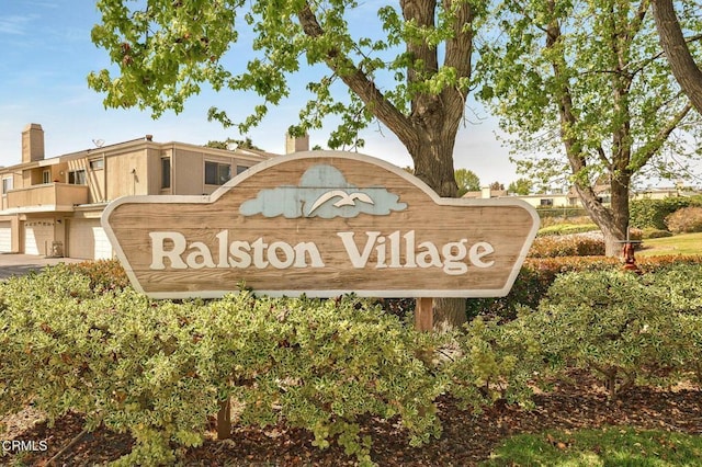 view of community sign