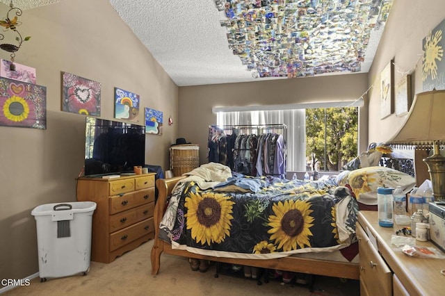 bedroom featuring carpet flooring, vaulted ceiling, and a textured ceiling