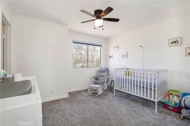 40824 Cobblestone Ct, Palmdale, CA 93551 - carpeted bedroom with a sink, a nursery area, baseboards, and a ceiling fan