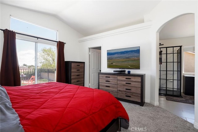 40824 Cobblestone Ct, Palmdale, CA 93551 - bedroom with access to outside, vaulted ceiling, arched walkways, and baseboards