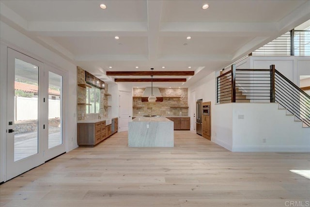 24321 Barona Mesa Rd, Ramona, CA 92065 - kitchen featuring open shelves, light countertops, and a healthy amount of sunlight
