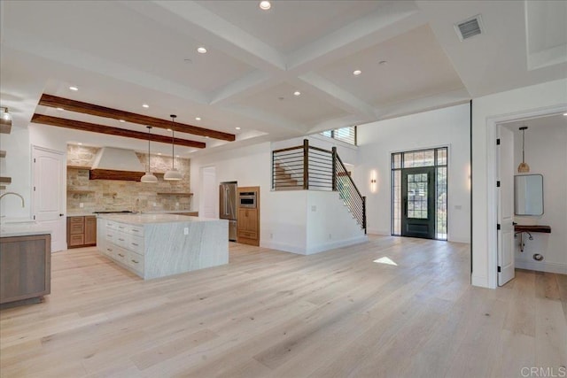 24321 Barona Mesa Rd, Ramona, CA 92065 - kitchen with freestanding refrigerator, beam ceiling, decorative backsplash, and visible vents
