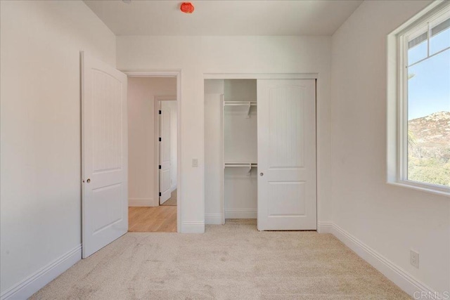 24321 Barona Mesa Rd, Ramona, CA 92065 - unfurnished bedroom featuring carpet, a closet, and baseboards