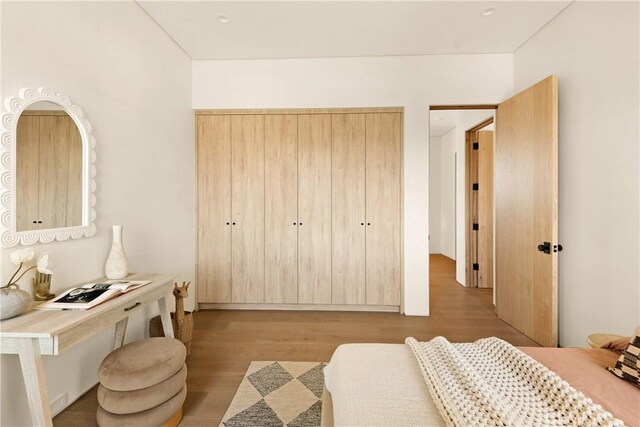bedroom featuring wood finished floors