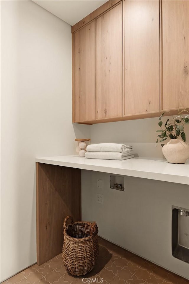 laundry area with cabinet space and washer hookup