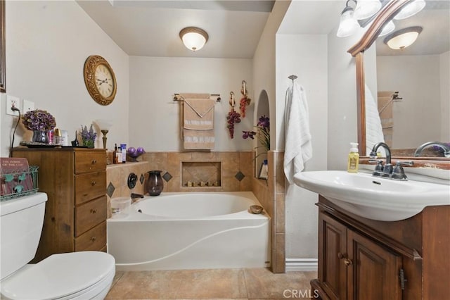 20130 Monte Vista Rd, Apple Valley, CA 92308 - bathroom featuring toilet, a garden tub, vanity, and tile patterned flooring