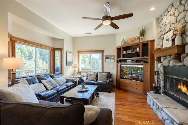 813 Brentwood Dr, Lake Arrowhead, CA 92352 - living room featuring ceiling fan, a stone fireplace, light wood-type flooring, and recessed lighting