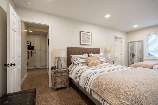 bedroom featuring recessed lighting and carpet flooring