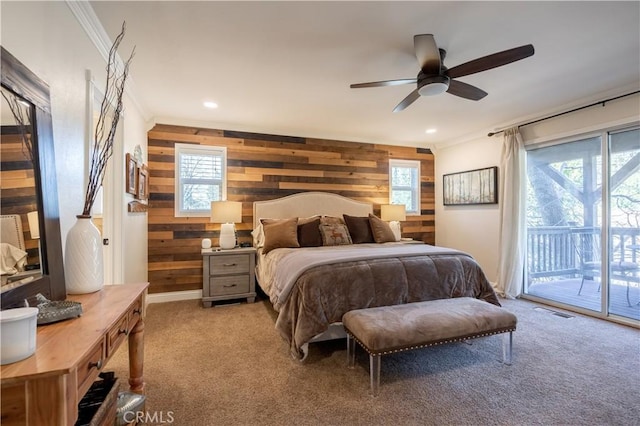 813 Brentwood Dr, Lake Arrowhead, CA 92352 - bedroom featuring wood walls, access to exterior, light carpet, multiple windows, and recessed lighting