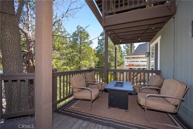 813 Brentwood Dr, Lake Arrowhead, CA 92352 - deck featuring an outdoor fire pit