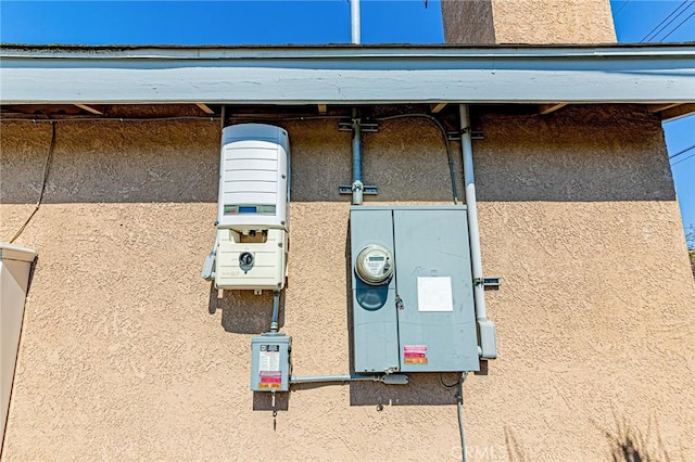 exterior view of stucco siding and related energy utilities