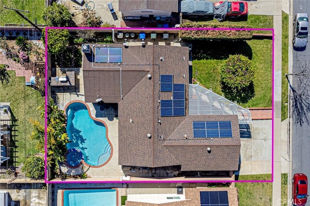 aerial view of property's location with a pool and property boundaries highlighted