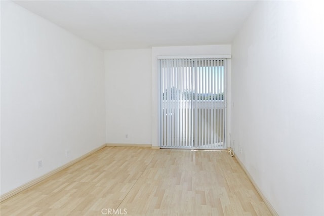 19350 Sherman Way Unit 114, Reseda, CA 91335 - unfurnished room featuring wood finished floors