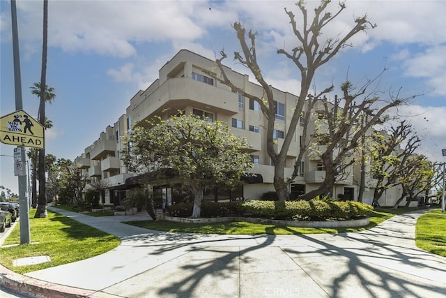 19350 Sherman Way Unit 114, Reseda, CA 91335 - view of building exterior featuring a residential view