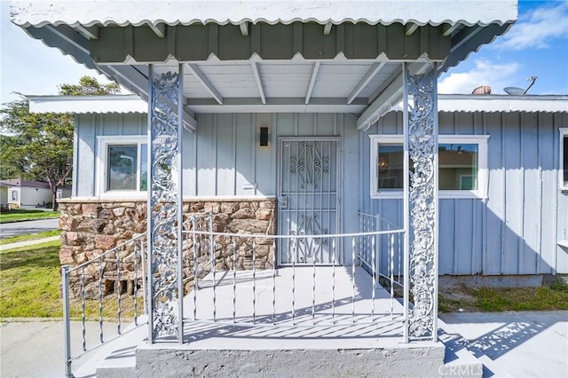 6160 California Ave, Long Beach, CA 90805 - property entrance with stone siding and board and batten siding