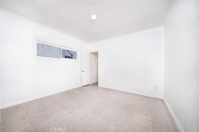 6160 California Ave, Long Beach, CA 90805 - spare room featuring crown molding and baseboards