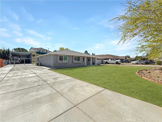 7455 Bangor Ave, Hesperia, CA 92345 - single story home featuring driveway, a chimney, a front yard, a garage, and stucco siding