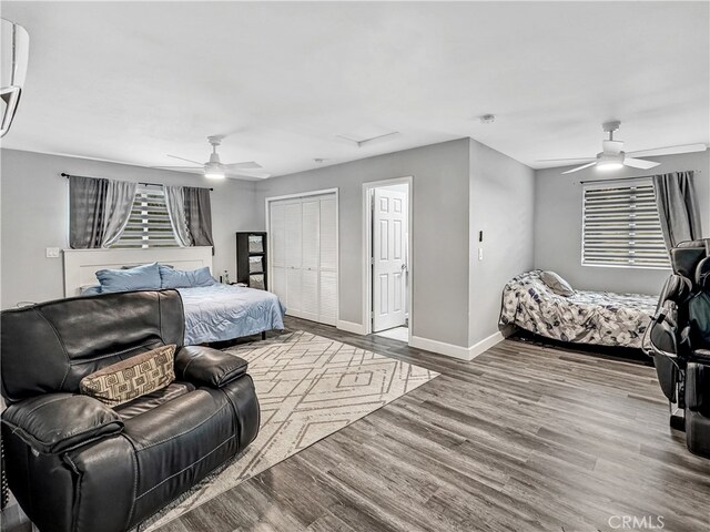 7455 Bangor Ave, Hesperia, CA 92345 - bedroom featuring baseboards, wood finished floors, attic access, and a closet