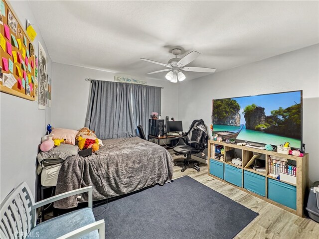 7455 Bangor Ave, Hesperia, CA 92345 - bedroom featuring ceiling fan and wood finished floors