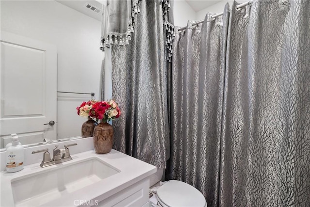 16614 Trailblazer Ave, Chino, CA 91708 - bathroom with a shower with shower curtain, vanity, visible vents, and toilet