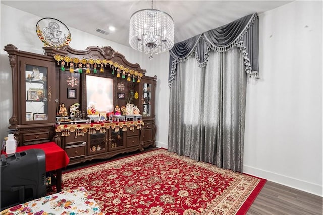 16614 Trailblazer Ave, Chino, CA 91708 - interior space with a chandelier, wood finished floors, baseboards, and visible vents
