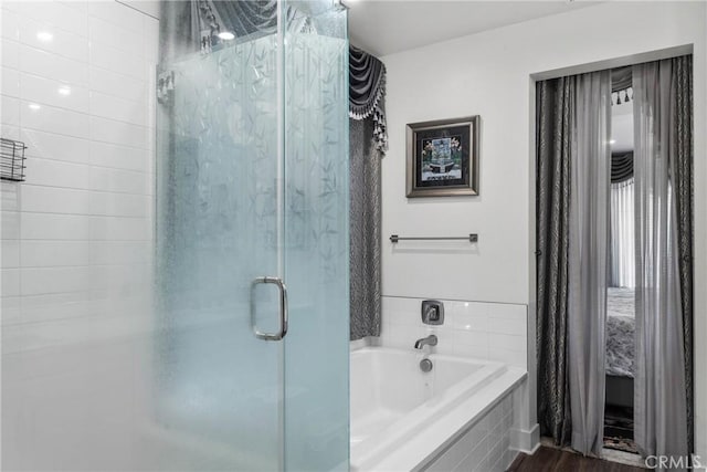 16614 Trailblazer Ave, Chino, CA 91708 - full bathroom with a shower stall, a garden tub, and wood finished floors