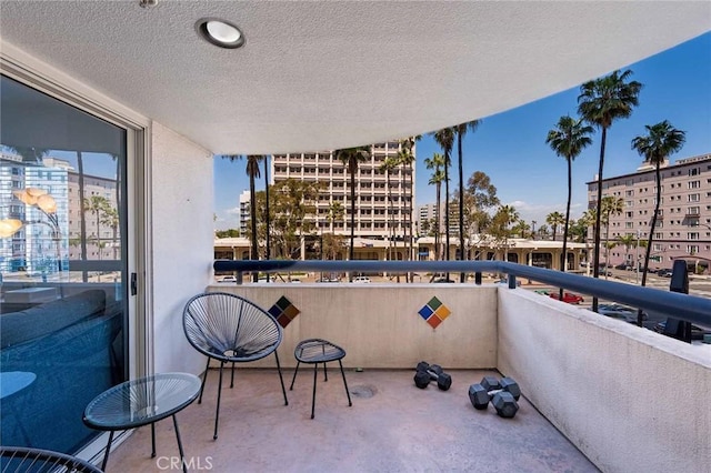 balcony featuring a view of city