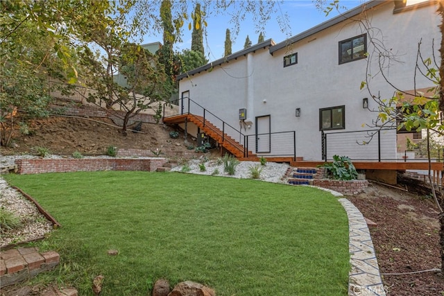 view of yard featuring stairway