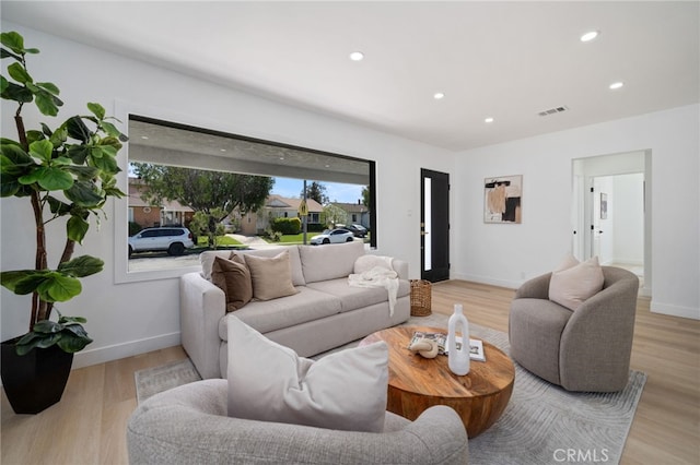 3533 Deerford St, Lakewood, CA 90712 - living area featuring recessed lighting, light wood-type flooring, and baseboards