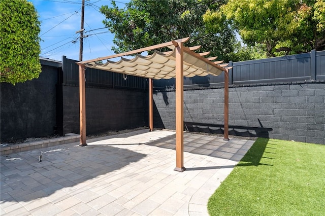 3533 Deerford St, Lakewood, CA 90712 - view of patio / terrace with a carport and a fenced backyard