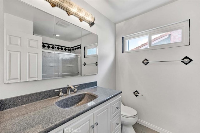 25 Bennington, Irvine, CA 92620 - bathroom with vanity, a shower with door, toilet, tile patterned floors, and baseboards