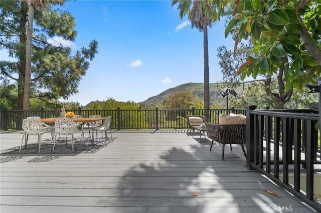 115 Buckskin Rd, Bell Canyon, CA 91307 - wooden terrace with a mountain view and outdoor dining area