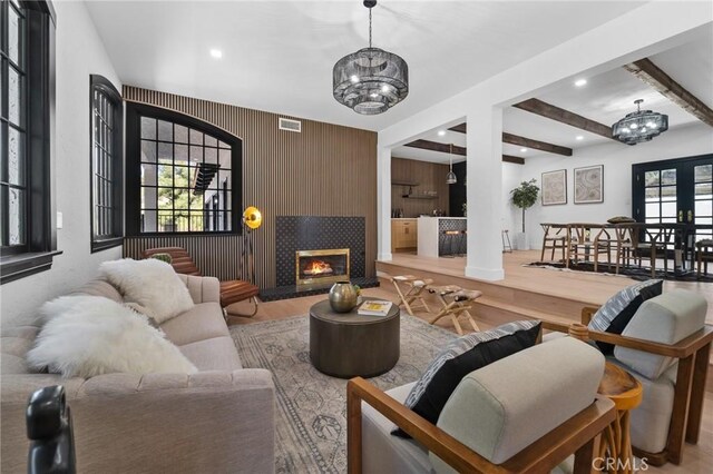 115 Buckskin Rd, Bell Canyon, CA 91307 - living room featuring a chandelier, wood finished floors, recessed lighting, a tile fireplace, and beamed ceiling