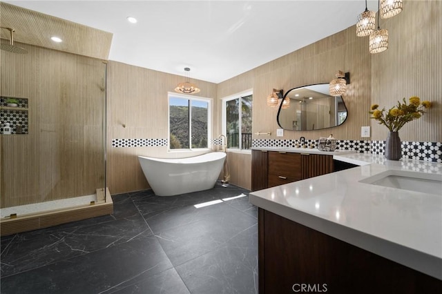 115 Buckskin Rd, Bell Canyon, CA 91307 - bathroom featuring a shower stall, double vanity, a freestanding bath, decorative backsplash, and recessed lighting