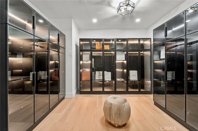 115 Buckskin Rd, Bell Canyon, CA 91307 - spacious closet featuring wood finished floors