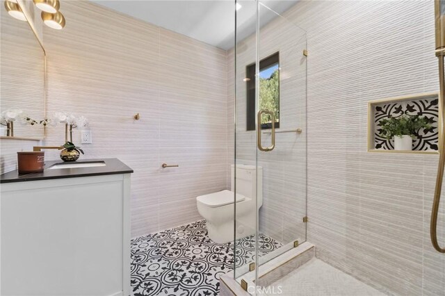 115 Buckskin Rd, Bell Canyon, CA 91307 - bathroom featuring a shower stall, toilet, vanity, tile walls, and tile patterned flooring