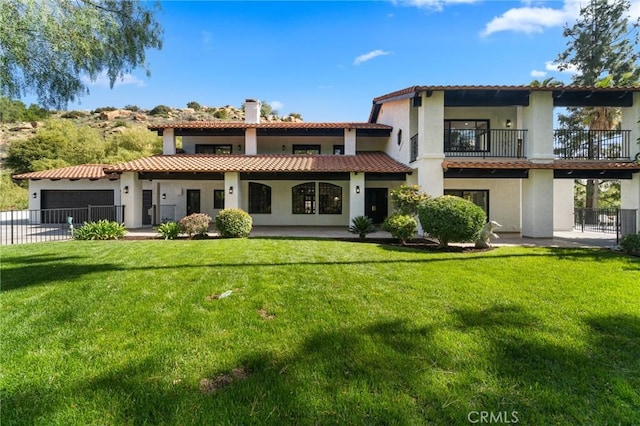 115 Buckskin Rd, Bell Canyon, CA 91307 - back of property with an attached garage, a balcony, stucco siding, and a chimney